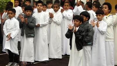 Students of Al Ameen School in Abu Dhabi gather for a school assembly after returning from the winter break.