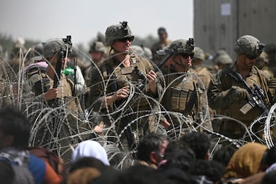 US soldiers stand guard during the withdrawal from Kabul in 2021. AFP