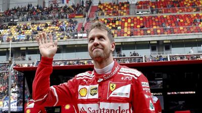 Ferrari driver Sebastian Vettel has the early championship lead after his victory in the Australian Grand Prix. Andy Wong / AP Photo