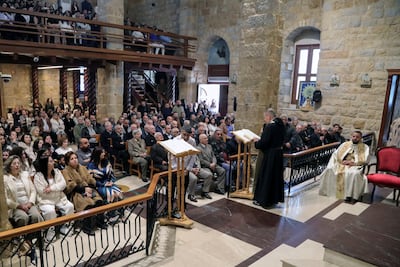 Worshippers attend the Easter Sunday service inside St Georges Church. Reuters
