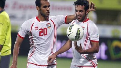 Ali Mabkhout, right, alongside his international teammate Saeed Al Kathiri. The two are likely to face each other today in the Abu Dhabi derby between Al Jazira and Al Wahda. Pawan Singh / The National