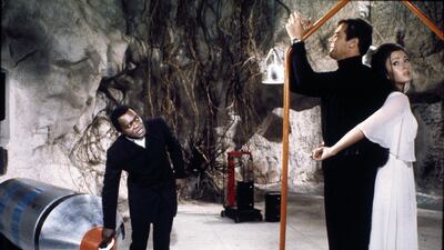 Dr Kananga/Mr Big (left), Caribbean, played by Yaphet Kotto in ‘Live and Let Die’ (1973). Drug smuggler, voodoo cult leader, and dictator of the fictional island of San Monique, Dr Kananga goes out in explosive fashion when Bond forces a compressed gas capsule down his throat, bringing a swift end to his nefarious activities. Courtesy United Artists
