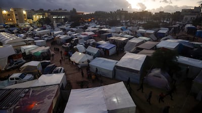 Displaced Palestinians in tents in Khan Younis. AP