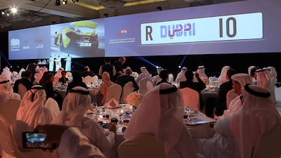 Punters bid for number plate 10 at the Reading Nation Auction at the Madinat Jumeirah in Dubai in 2016. Satish Kumar / The National.