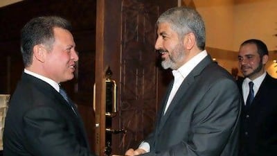King Abdullah II of Jordan (left) welcomes senior Hamas leader Khaled Meshaal upon his arrival to the Royal Palace in Amman last month. Hamas is seen as a key player in the relationship between the Jordanian monarchy and the Muslim Brotherhood, which has become increasingly strained.