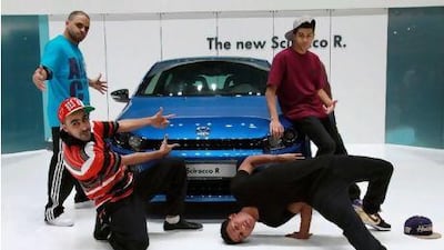 Hopefully, these breakdancers won't be the new salesemen in the Volkswagen dealership. Gabriela Maj / Bloomberg