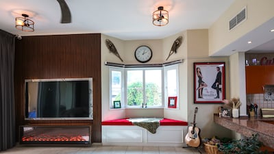 The light and airy living area of the one-bedroom home
