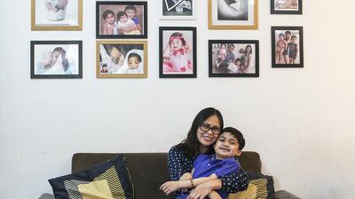 Arcelyn Barros, and her son Rafael. The mum says she is staying strong for Rafael, despite the cash shortage. Mona Al Marzooqi / The National
