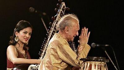Indian sitar maestro Ravi Shankar performing with his daughter Anoushka Shankar. Private memorials will be held in India and California for the musician who died at the age of 92. Deshakalyan Chowdhury /AFP