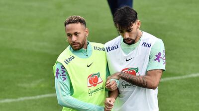 Brazil's Neymar alongside Lucas Paqueta. Reuters