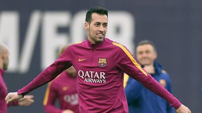 Barcelona’s midfielder Sergio Busquets gestures during a training session at the Sports Center FC Barcelona Joan Gamper in Sant Joan Despi, near Barcelona on April 1, 2016 on the eve their Spanish La Liga Clasico football match FC Barcelona vs Real Madrid. AFP / LLUIS GENE