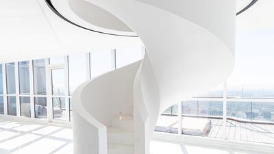 The Penthouse has been designed in minimalist, luxury style, and features a marble spiral staircase.