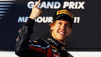 Sebastian Vettel, the Red Bull Racing driver, celebrates his Australian Grand Prix victory.