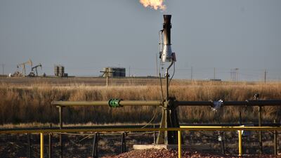 Gas flaring in North Dakota. The IEA says methane emissions from the energy sector can be reduced by 75 per cent using existing technology. AP