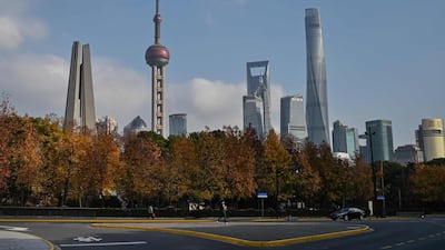 The skyline of the Lujiazui financial district in Shanghai. The US-China trade war is de-escalating as odds of a global recession in 2020 drop to one to five, IHS Markit says. AFP.