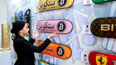 Works from Bitcoin Museum Nashville are displayed at the Bitcoin Mena 2025 conference in Abu Dhabi. Victor Besa / The National