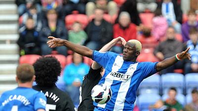 STRIKER: Wigan Athletic's Arouna Kone may have been suspiciously offside, but his physical presence and movement caused problems all day for Everton. Martin Rickett/PA