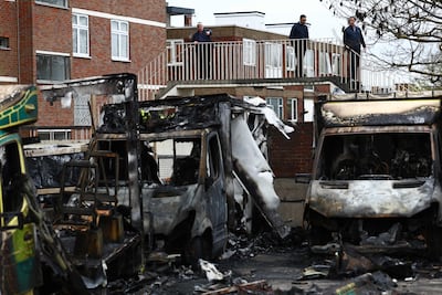 The burnt out remains of ambulances belonging to a Jewish community group in north London. AFP