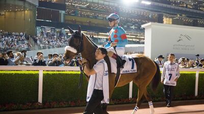 DUBAI, UNITED ARAB EMIRATES - MARCH 30: Christophe Lemaire riding Japanese horse Almond Eye during the Dubai Turf in the Dubai World Cup Day at Meydan Racecourse on March 30, 2019 in Dubai, United Arab Emirates. (Photo by Lo Chun Kit /Getty Images)
