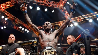 MIAMI, FLORIDA - APRIL 08: Israel Adesanya of Nigeria celebrates after knocking out Alex Pereira of Brazil in round 2 to reclaim the middleweight title during UFC 287 at Kaseya Center on April 08, 2023 in Miami, Florida. Carmen Mandato / Getty Images / AFP (Photo by Carmen Mandato / GETTY IMAGES NORTH AMERICA / Getty Images via AFP)