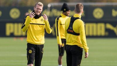 Borussia Dortmund’s Andre Schurrle, left, during training. Guido Kirchner / EPA