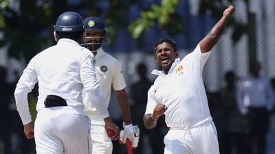 Sri Lanka's Rangana Herath celebrates after dismissing Ishant Sharma of India on Saturday as the hosts won the first Test in Galle. Ishara S Kodikara / AFP / August 15, 2015