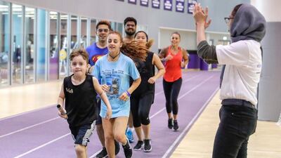 Runners take part in the 12-hour relay in honour of World Refugee Day at New York University Abu Dhabi. Victor Besa/The National
