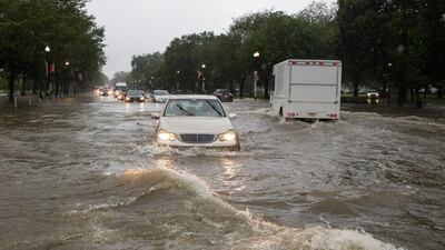 Driving conditions were treacherous after heavy rainfall in Washington DC and Virginia. AP Photo