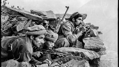 'Mujahideen Watch a Soviet Convoy. Nuristan, Afghanistan, 1979'.