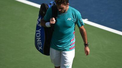 Stan Wawrinka leaves the court after his straight sets defeat to Damir Dzumhur in the first round of the Dubai Duty Free Tennis Championships on Tuesday. Tom Dulat / Getty Images