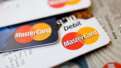 Credit card spending is a major factor in the growth of consumes loans in the UAE. Andrew Harrer / Bloomberg News