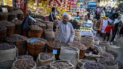 A man sells dates at a market in Cairo's central Sayyida Zeinab district, as Muslims prepare for Ramadan. AFP
