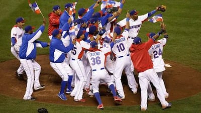 Dominican Republic players celebrate after beating Puerto Rico in the final of the World Baseball Classic.