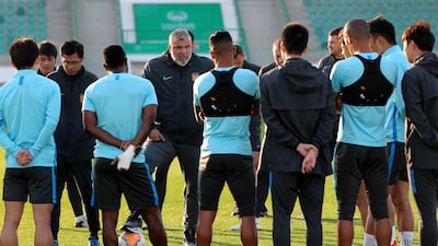 Cosmin Olaroiu gives his squad instructions.