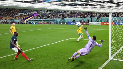 Craig Goodwin of Australia scores their first goal past Hugo Lloris of France. Getty