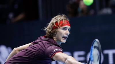 Alexander Zverev returns the ball to Stefanos Tsitsipas during an exhibition match at the ATP Next Gen tennis tournament finals, in Rho, near Milan, Italy. Luca Bruno / AP Photo