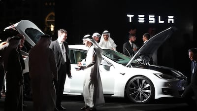 Tesla will open its regional headquarters in Dubai. The electric car maker has reassured investors that its Model 3 is on track. Karim Sahib / AFP