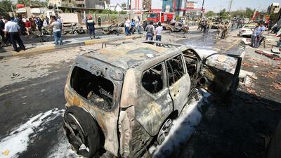 The site of a suicide attack in Basra on April 4, 2016. Moahmmed Ali / AFP Photo