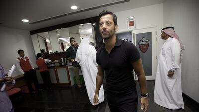 Quique Sanchez Flores left his position as coach of Al Ahli in June. Jaime Puebla / The National