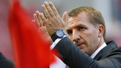Liverpool manager Brendan Rodgers applauds fans after the victory over Stoke. Darren Staples / Reuters
