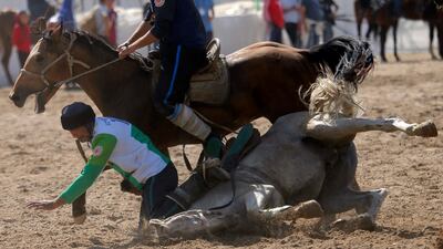 Uzbek and French horsemen take part in kok-boru. EPA