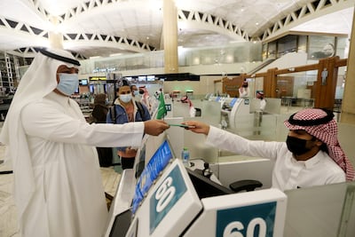Passengers pass through King Khalid International Airport in Riyadh. Reuters
