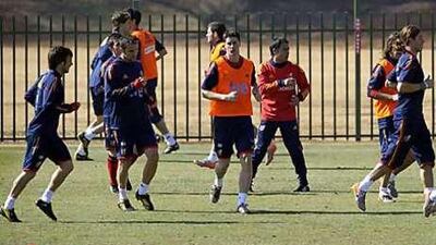 The Spain squad train ahead of their final Group H match with Chile, knowing a draw will see them qualify for the second round.