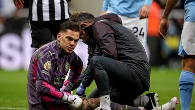 City's Ederson is treated before his eventual substitution due to injury. EPA