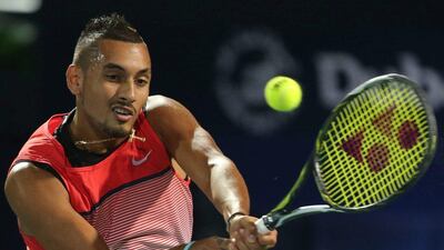 Nick Kyrgios from Australia returns the ball to Martin Klizan from Slovakia during a second day match of the Dubai Tennis Championships in Dubai, United Arab Emirates, Tuesday, Feb. 23, 2016. (AP Photo/Kamran Jebreili)