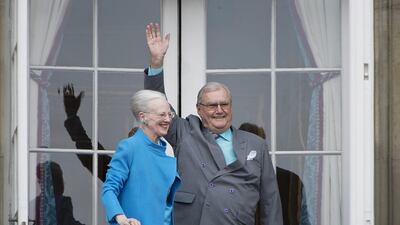 Queen Margrethe II of Denmark and her husband Prince Henrik on the balcony of the Amalienborg Palace in Copenhagen on the occasion of Queen Margrethe's 76th birthday celebration on April 16, 2016. Marie Hald / Reuters