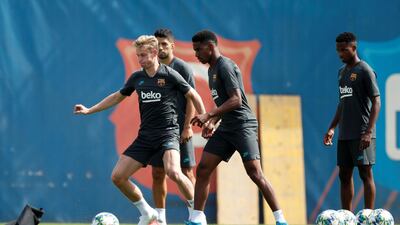 Barcelona's Frenkie de Jong, Luis Suarez, Junior Firpo and Anssumane Fati during training. Reuters
