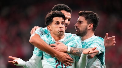 Portugal's Joao Cancelo celebrates scoring the first goal in the Uefa Nations League match against Denmark. Reuters