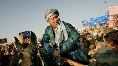 General Abdul Rashid Dostum sits on a horse during his final campaign rally at Kabul stadium in Kabul, Afghanistan, October 6, 2004. Getty Images