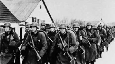 "Denmark's initial passivity before the Nazis is a large-scale version of the icy inaction that grips their family": German troops march into the city of Aalborg on the first day of occupation.